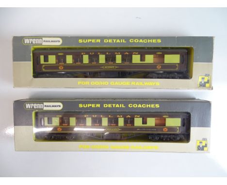 OO SCALE MODEL RAILWAYS: A pair of WRENN Pullman cars comprising: W6002A 'Audrey' and W6012 'Pegasus' - both with brown table