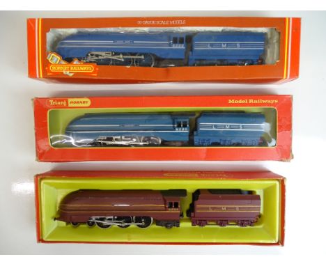 OO SCALE MODEL RAILWAYS: A group of Coronation Class streamlined locomotives by TRI-ANG / HORNBY to include an: R871 'King Ge