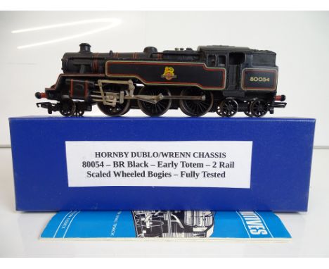 OO SCALE MODEL RAILWAYS: A HORNBY DUBLO Class 4MT Standard tank locomotive body numbered 80054 fitted to a 2 rail WRENN chass