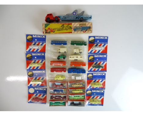 VINTAGE TOYS: A selection of TRI-ANG MINIX cars and buses with a significant number still sealed in original packets - togeth