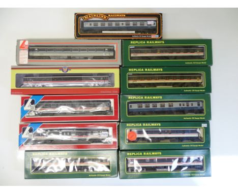 OO SCALE MODEL RAILWAYS: A large group of Mark 1 and Mark 3 coaches by LIMA, REPLICA, MAINLINE and OXFORD RAIL in various liv