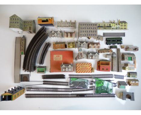 OO SCALE MODEL RAILWAYS: A quantity of buildings and HORNBY OO track together with a selection of N SCALE: including a GRAHAM