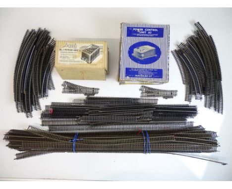 OO SCALE MODEL RAILWAYS: A large quantity of track by PECO and others together with a pair of power control units - F/G