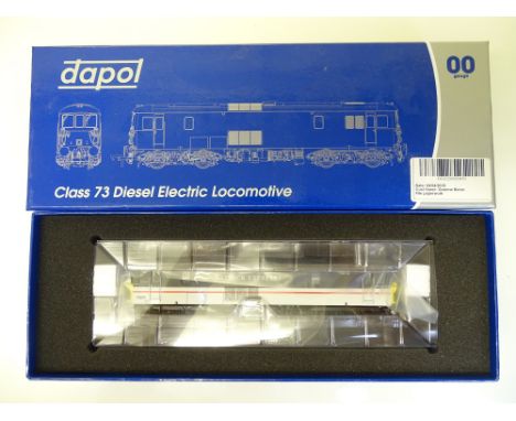 OO SCALE MODEL RAILWAYS: A DAPOL Class 73 diesel electric locomotive 'County of East Sussex' numbered 73207 in Gatwick Expres