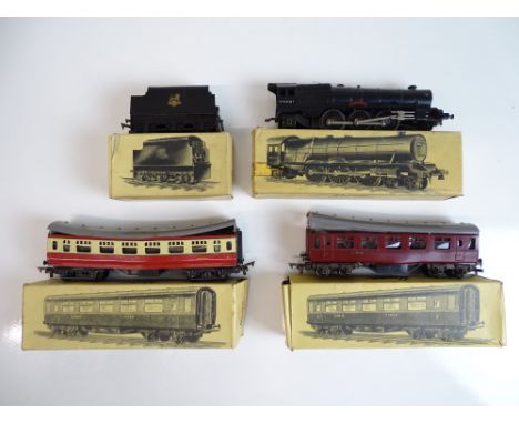 OO SCALE MODEL RAILWAYS: A group of original ROVEX rolling stock to include a Princess Class and two coaches with usual plast