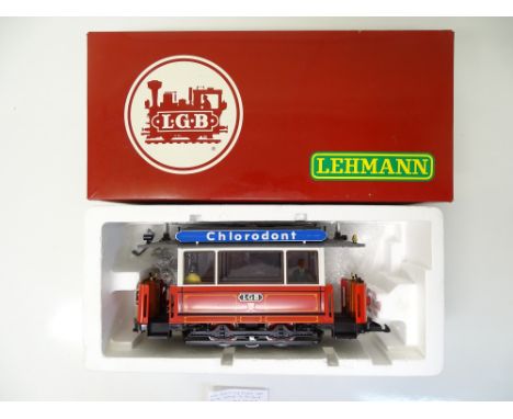 G SCALE MODEL RAILWAYS: An LGB 2036 tram car in red/cream livery - G (some parts possibly missing) in incorrect 2035 box