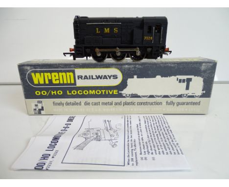 OO SCALE MODEL RAILWAYS: A WRENN W2233 0-6-0 diesel locomotive in LMS black numbered 7124 - VG in G box