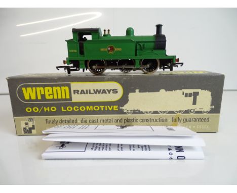 OO SCALE MODEL RAILWAYS: A WRENN W2206 R1 Class steam tank locomotive in BR green livery numbered 31340 - G in G box