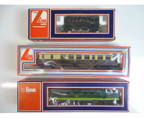 OO SCALE MODEL RAILWAYS: A pair of diesel locos and a diesel railcar by LIMA - G/VG in F/G boxes (3)