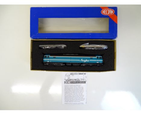 OO SCALE MODEL RAILWAYS: A HELJAN 4662 Class 47 diesel locomotive numbered 47714 in Anglia Railways livery - VG/E in F/G box