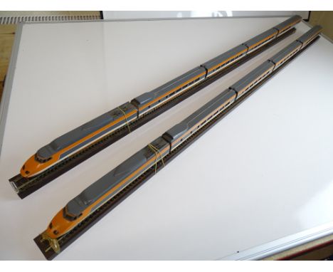 HO SCALE MODEL RAILWAYS: A static model of a French TGV train by MAQUETTES ARMA in two parts in original orange and grey live