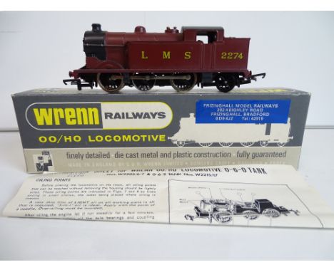 OO SCALE MODEL RAILWAYS: A WRENN W2214 0-6-2 tank locomotive in LMS maroon numbered 2274 - G in G box