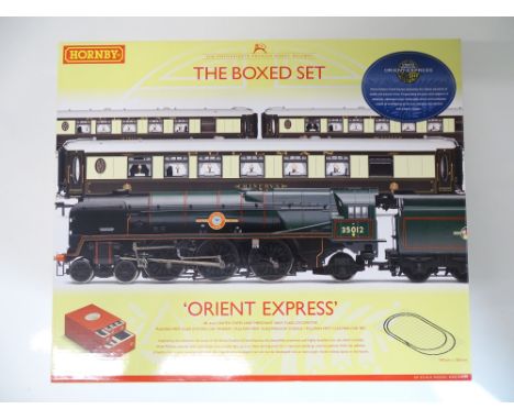 OO SCALE MODEL RAILWAYS: A HORNBY R1038 'The Orient Express' Premier boxed complete train set to include BR 4-6-2 'United Sta