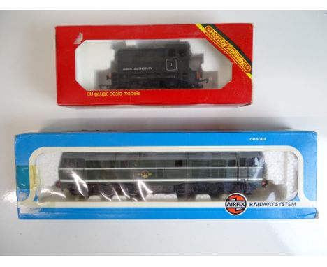 OO SCALE MODEL RAILWAYS: A pair of diesel locomotives by HORNBY and AIRFIX to include a dock shunter and a Class 31 - G in F/