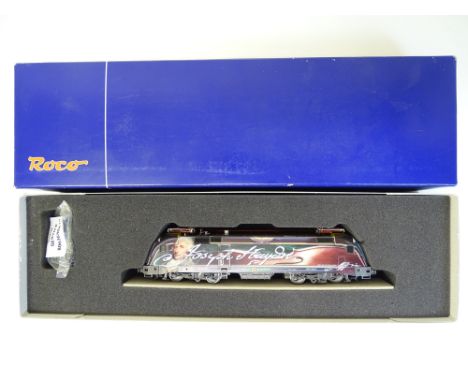 HO SCALE MODEL RAILWAYS: A ROCO 62365 BR1047 electric locomotive in GySEV Joseph Hayden livery - VG in VG box