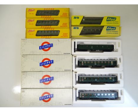 HO SCALE MODEL RAILWAYS: A group of German Outline passenger coaches by LILIPUT in green livery - G in G boxes (9)