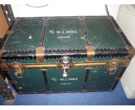 METAL BOUND TRAVELLING TRUNK, with 'Lansmuir 4 ply' label attached and stamped F/O W J Jinks 128085 to the top (missing inner