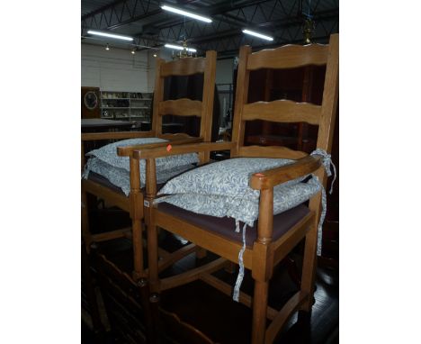 PAIR OF OAK LADDER BACK ARMCHAIRS 