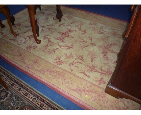 OCHRE GROUND RUG, with red floral detail, approximate size 236cm x 162cm and similar carpet runner approximate size 223cm x 6