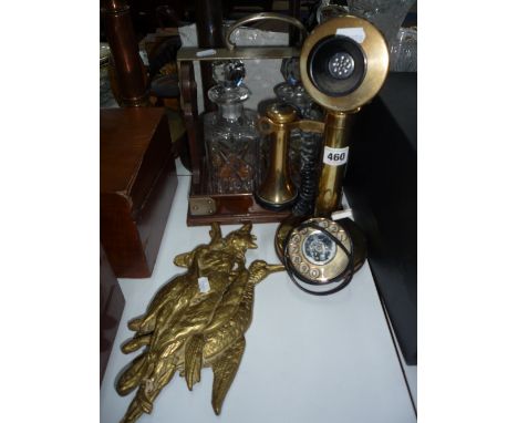 A BRASS CANDLESTICK TELEPHONE, a two bottled tantalus (no key) and two brass plaques (4)