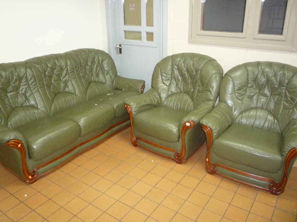 GREEN LEATHER THREE PIECE SUITE, with wood frame