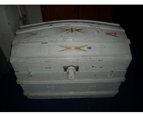 A PAINTED DOME TOP TRAVELLING TRUNK, and a metal basket with two handles (2)