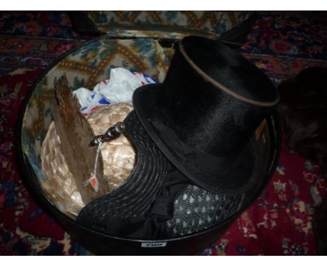 FOUR VINTAGE ITEMS, to include ladies hats, a top hat and a wooden fan (all within a hat box) (4) 