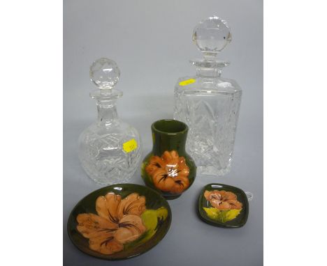 THREE MOORCROFT POTTERY TRINKETS, to include small vase and two trinket dishes, 'Hibiscus' pattern, impressed marks, together