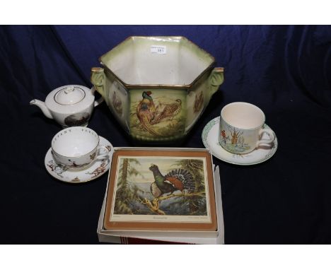 Twin handled jardiniere decorated with scenes of pheasants, a hunting scene teapot, set of six place mats depicting various g