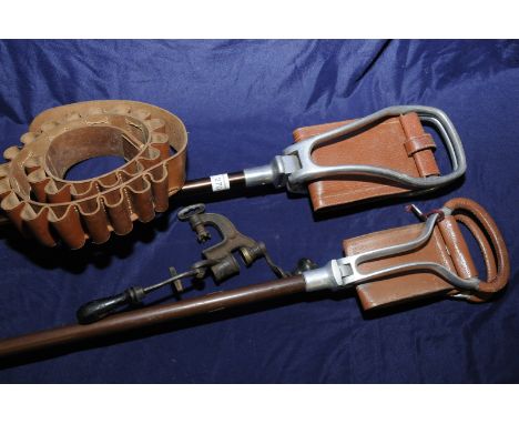 Two shooting sticks, a leather cartridge belt and a turnover reloading tool (4)