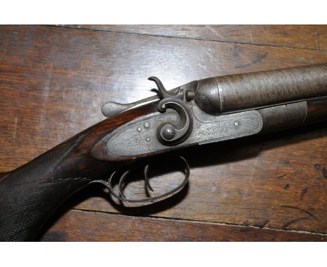 Hutchinson 12 bore side by side hammer gun with 30 inch barrels with traces of damascas, with C shaped hammers and chequered 