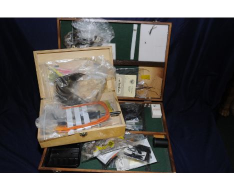 Large three sectional fly fishing fly tying equipment box with a large selection of fly tying accessories and another similar