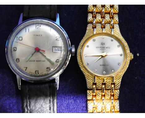 A Timex 1960's gents wrist watch and a Raymond Weil 1980's ladie's gold plated wrist watch 