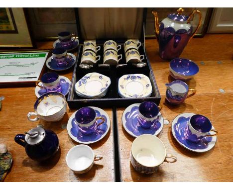 A cased set of Meir ware coffee cans, saucers &amp; spoons, a Phoenix china fifteen piece coffee service for six &amp; four i