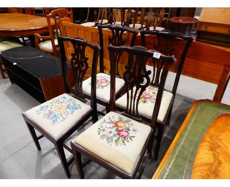 A set of four Georgian style Dining Chairs, shaped top rail, pierced vase shaped splats, drop in tapestry upholstered pad sea