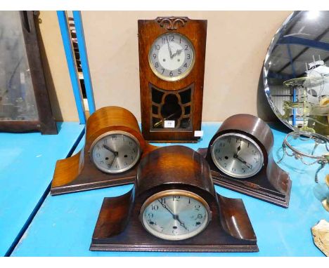 An early 20th Century Oak cased wall clock and three ' Napoleon Hat' mantle clocks  