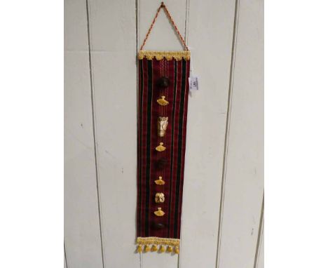 A small group of five Meiji period carved wood netsukes and wood and ivory sagemonos attached to a sash 