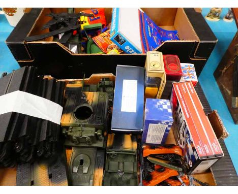 A collection of vintage toys including Thunderbirds penknives and die cast items