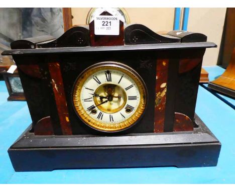 A large black slate Mantle clock