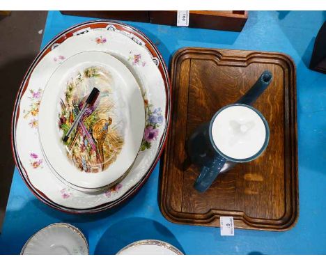 An Art Deco oak serving tray, two large oval meat plates &amp; three oval pheasant decorated plates