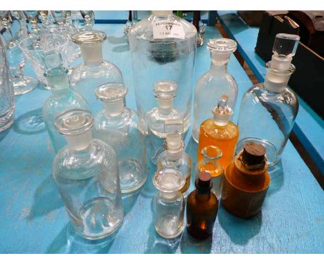 Fourteen vintage chemist apothecary bottles