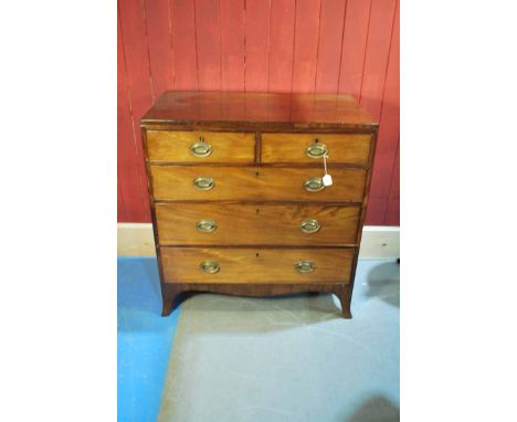 A Georgian mahogany Chest of Drawers, plain caddy top over an arrangement of two short drawers above three graduated full wid