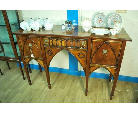 A good Regency style reproduction mahogany Sideboard, moulded edge rectangular top above a central drawer flanked by cupboard