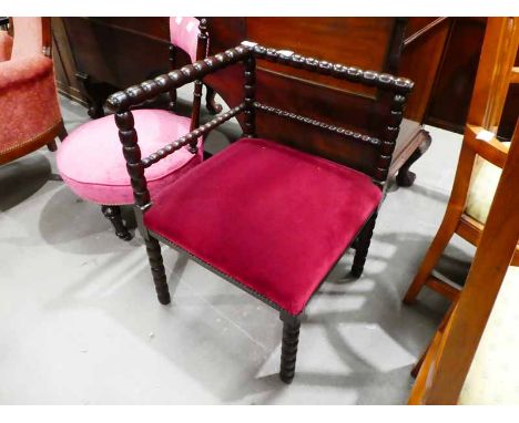 An early 20th century bobbin turned square corner chair with studded stuff over seat