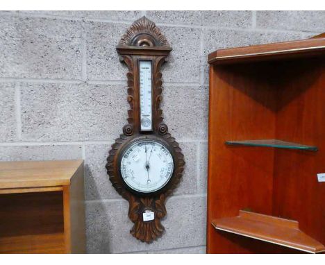 An Edwardian oak framed Barometer with Thermometer  