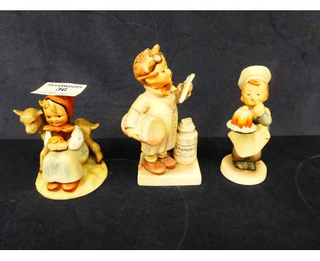 Three Hummel pottery models of children