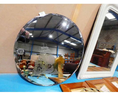 A Frameless circular Art Deco wall mirror decorated with Galleon 