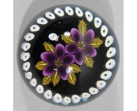 A Caithness paperweight Primroses, limited edition no. 98/250, etched marked beneath, 7cm high. 