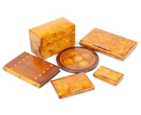 A mid 20thC burr wood card case, of rectangular outline with removable lid and sectional interior, 7cm high, 10cm wide, 6cm d