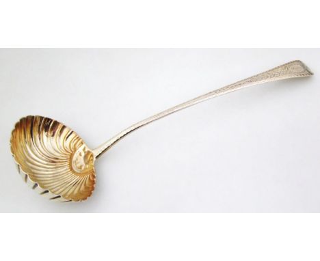 A George III silver soup ladle, by William Eley, bright cut Old English pattern with shell shaped bowl, London 1797, 32cm lon